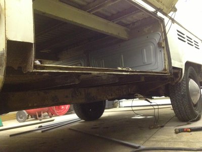 Rot cut out and ready for the replacement metal.