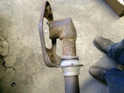 The plastic shift bushing on the front shift rod. Snap ring goes on the front side and the two bushings go on the rear shift rod for my bus. Earlier buses and later buses have different setups.