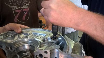 Chuck removing galley plugs